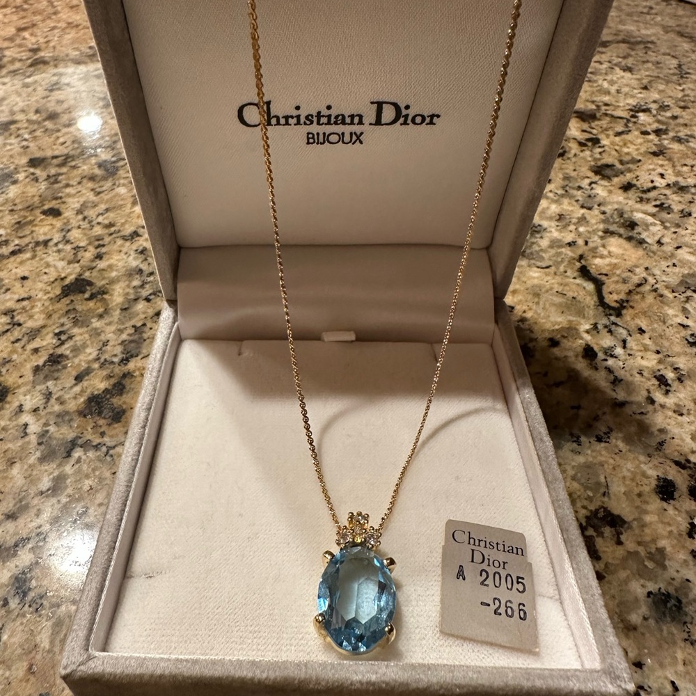 Vintage Dior Blue Gemstone and Gold Pendant Necklace
Like new. No tone loss.